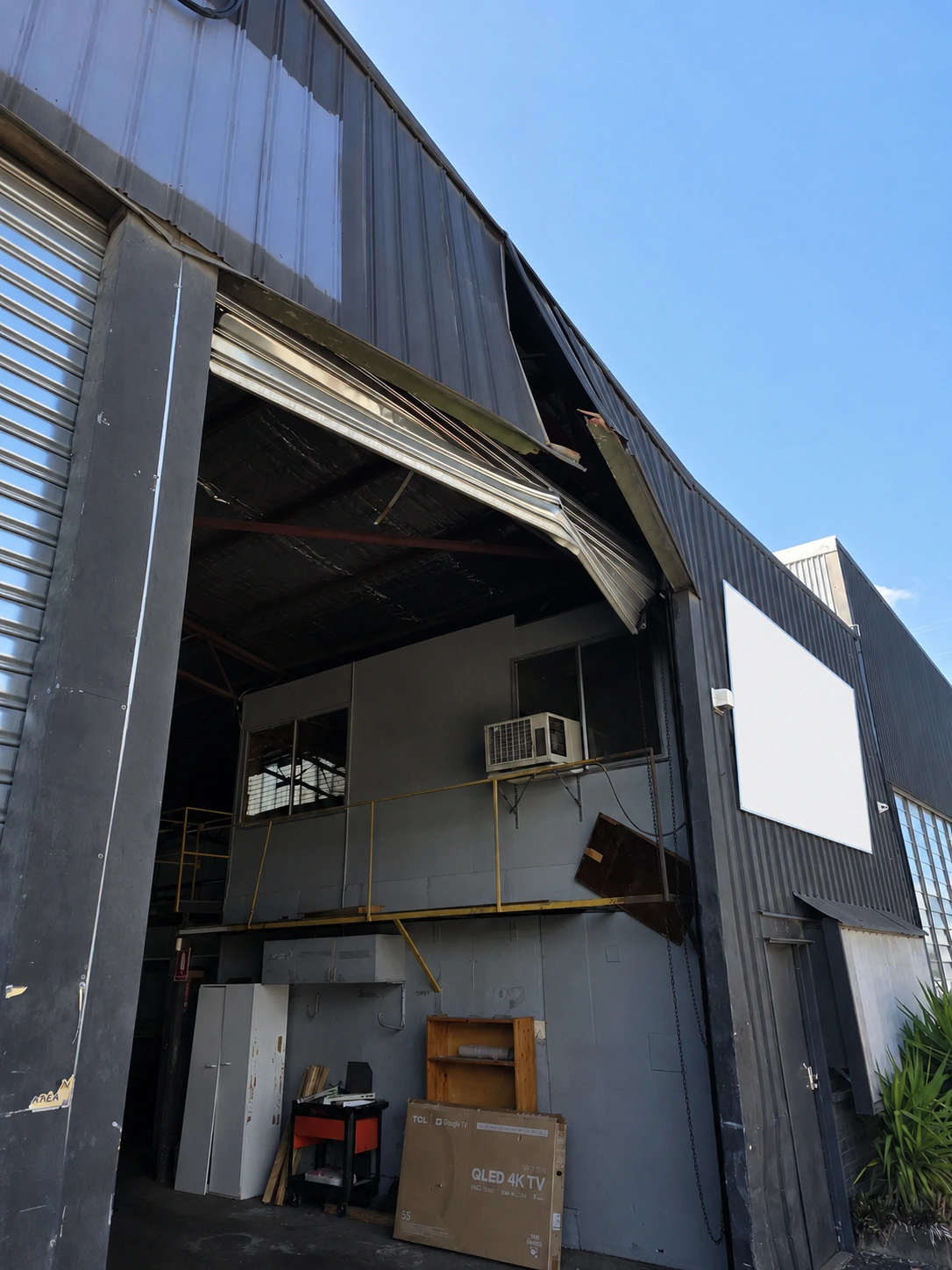 Industrial building roller door service example