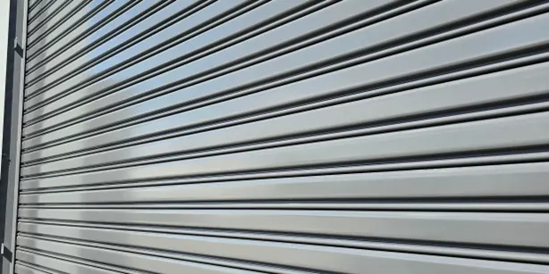 Close-up roller shutter door repair work